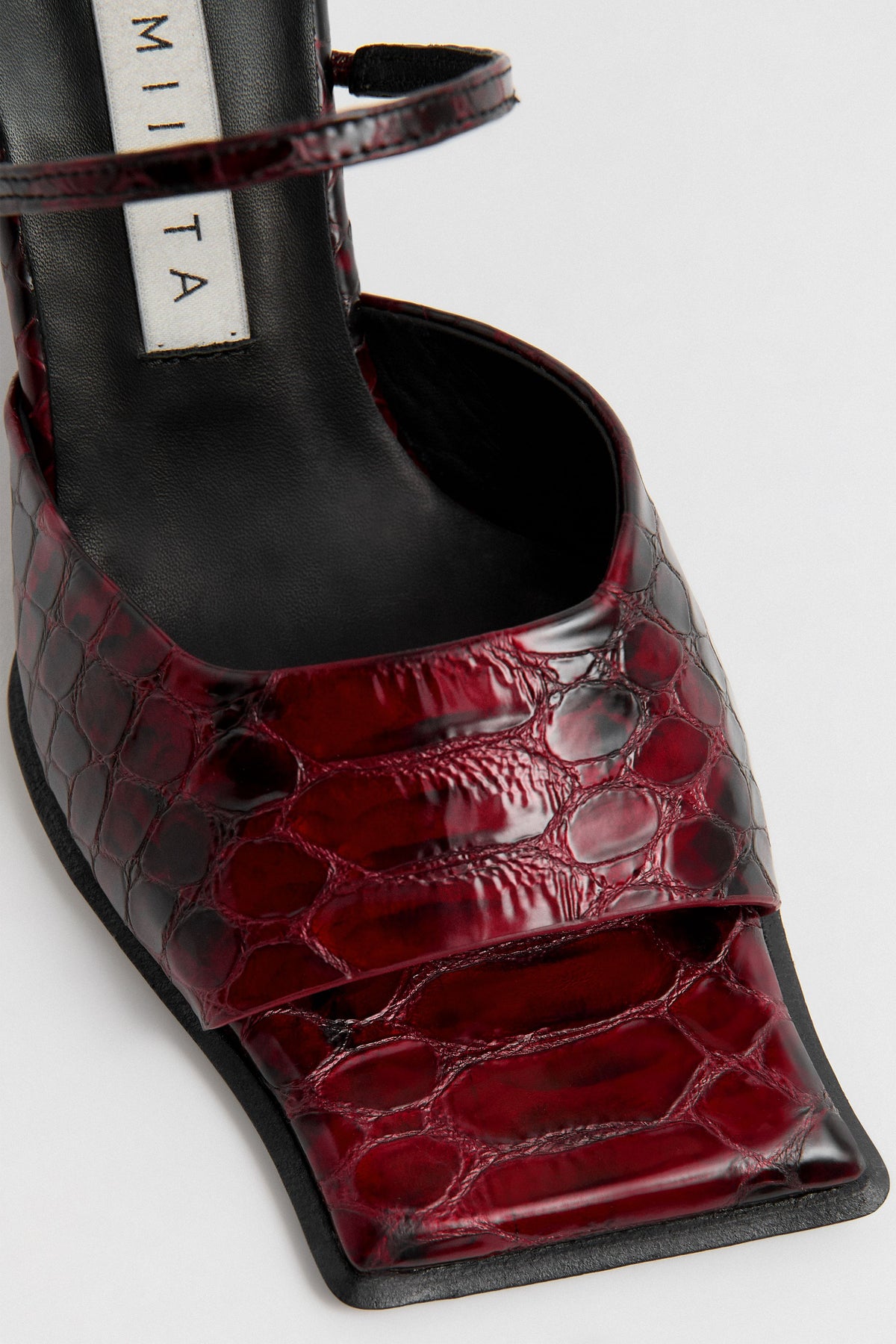 Miista Egle red snake embossed leather sandals close up view of toe of shoe