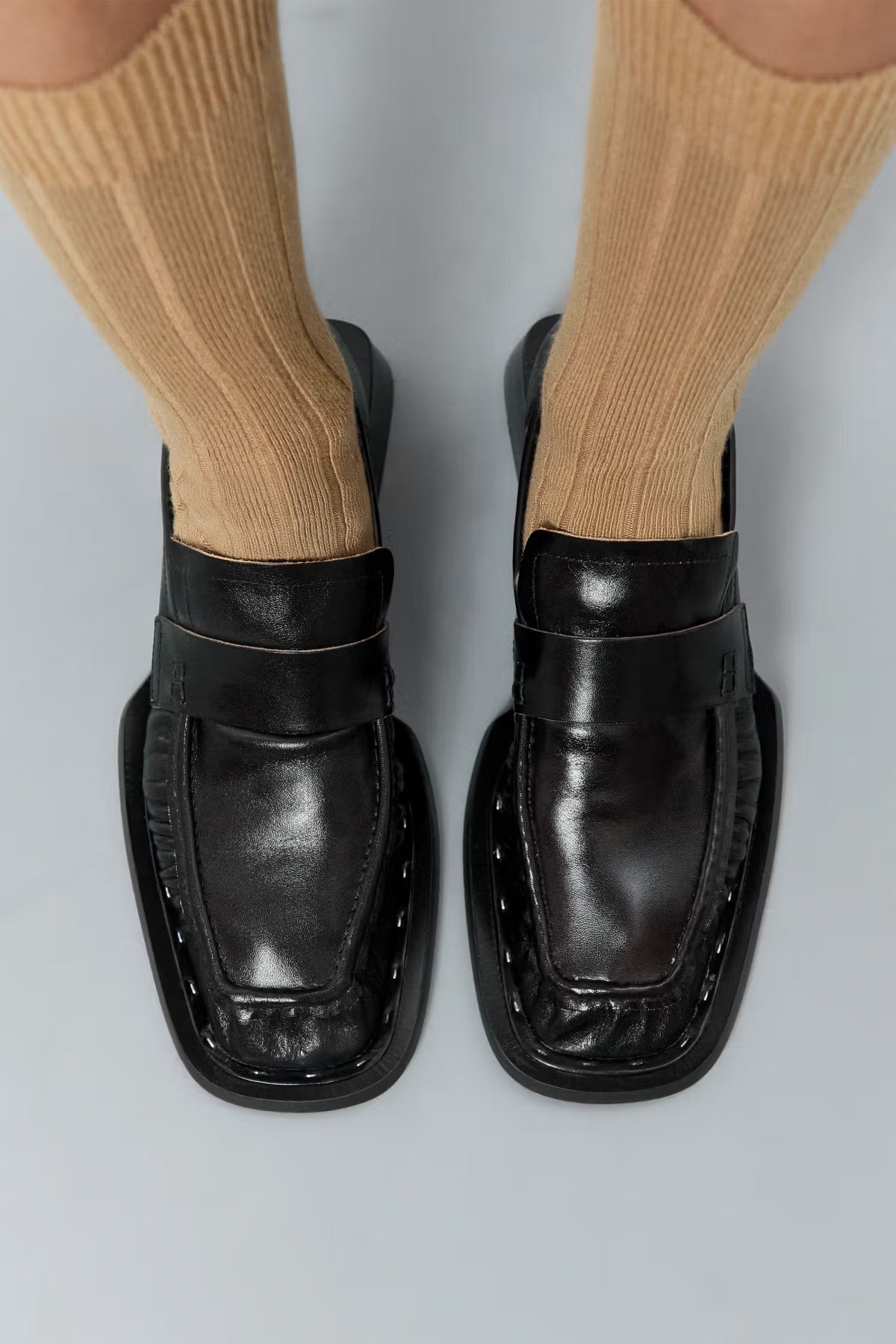 Birds eye of Miista Airi Black Loafers, wearing beige socks