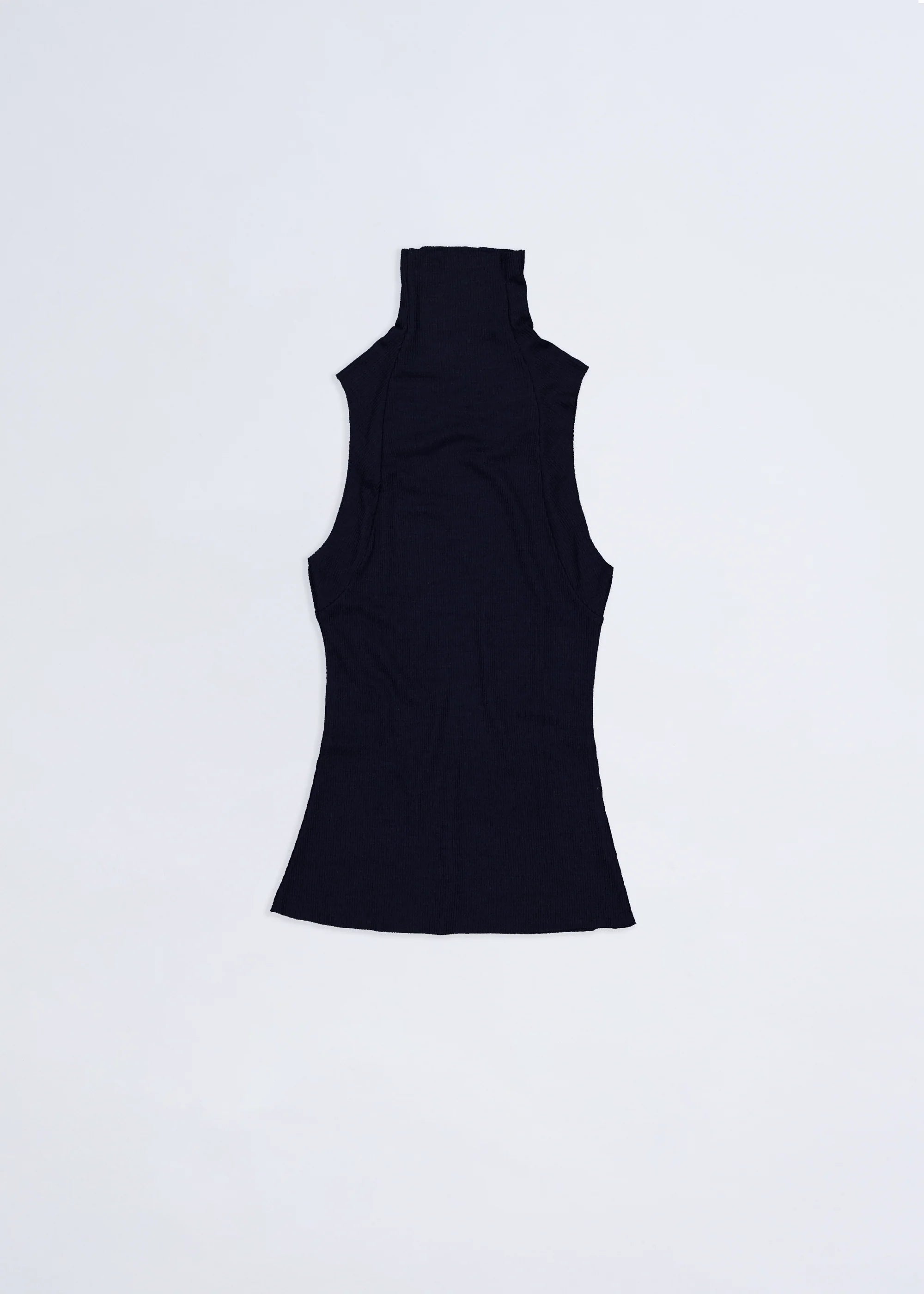 Ink sleeveless dissolve tank flatlay on a light gray background